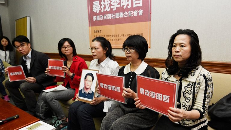 Taiwanese activist returns home after prison term in China | Human Rights News